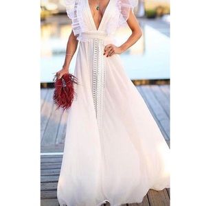 White maxi dress size small. Never been worn